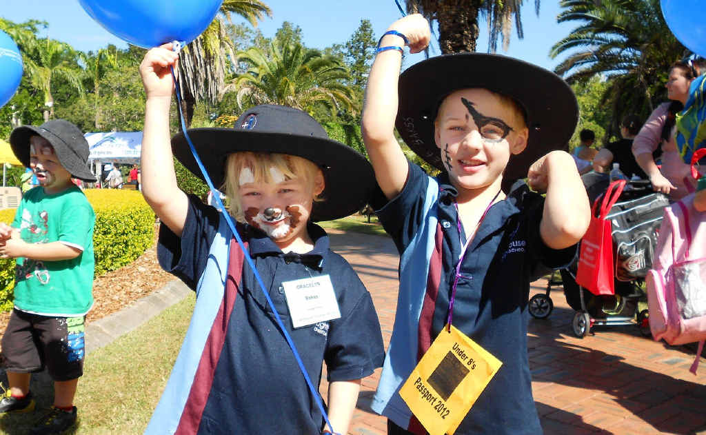 Gracelyn Bakss (4) and Caleb Bakss (6) just finished having their face painted in time for a quick photo at the CQU Romp in the Park at Rockhampton Botanical Gardens.