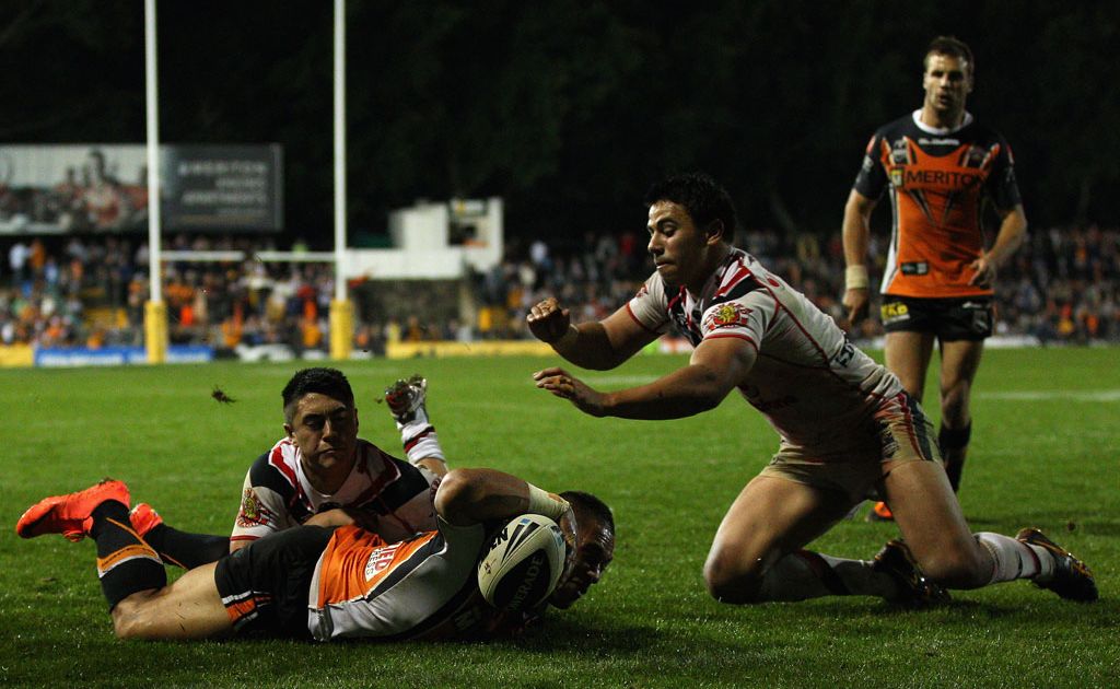 Matt Utai of the Tigers scores a try during the round 11 NRL match between the Wests Tigers and the Warriors at Leichhardt Oval Matt Utai of the Tigers scores a try during the round 11 NRL match between the Wests Tigers and the Warriors at Leichhardt Oval