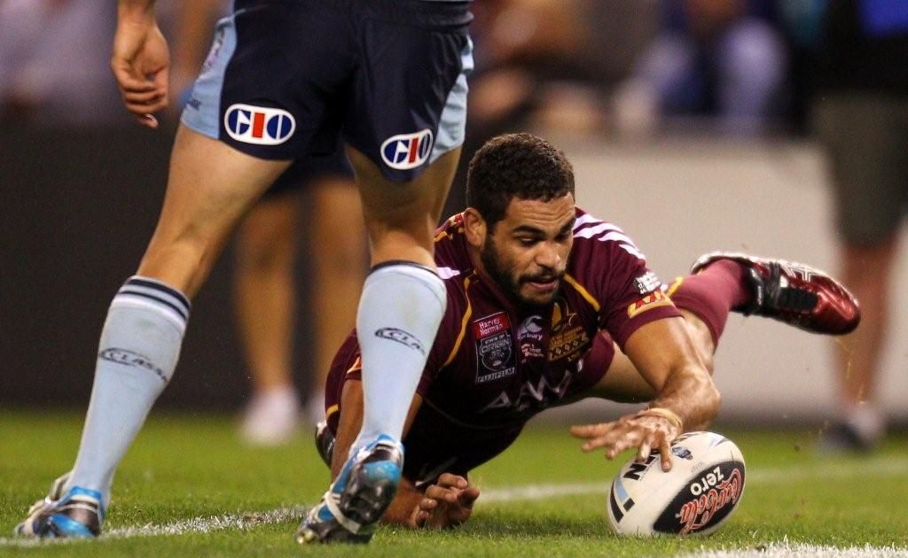Greg Inglis of the Maroons scores a try during game one of the ARL State of Origin series between the Queensland Maroons and the New South Wales Blues at Etihad Stadium on May 23, 2012 in Melbourne, Australia. Greg Inglis of the Maroons scores a try during game one of the ARL State of Origin series between the Queensland Maroons and the New South Wales Blues at Etihad Stadium on May 23, 2012 in Melbourne, Australia.