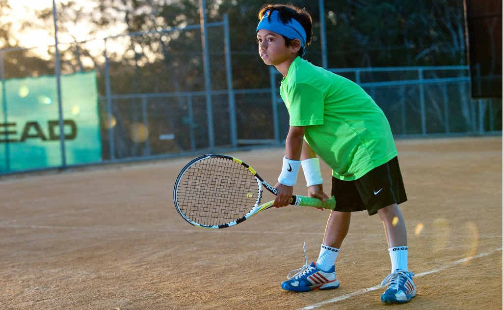 Nine-year-old tennis star Ralph Armstrong, at Sawtell courts. Nine-year-old tennis star Ralph Armstrong, at Sawtell courts.