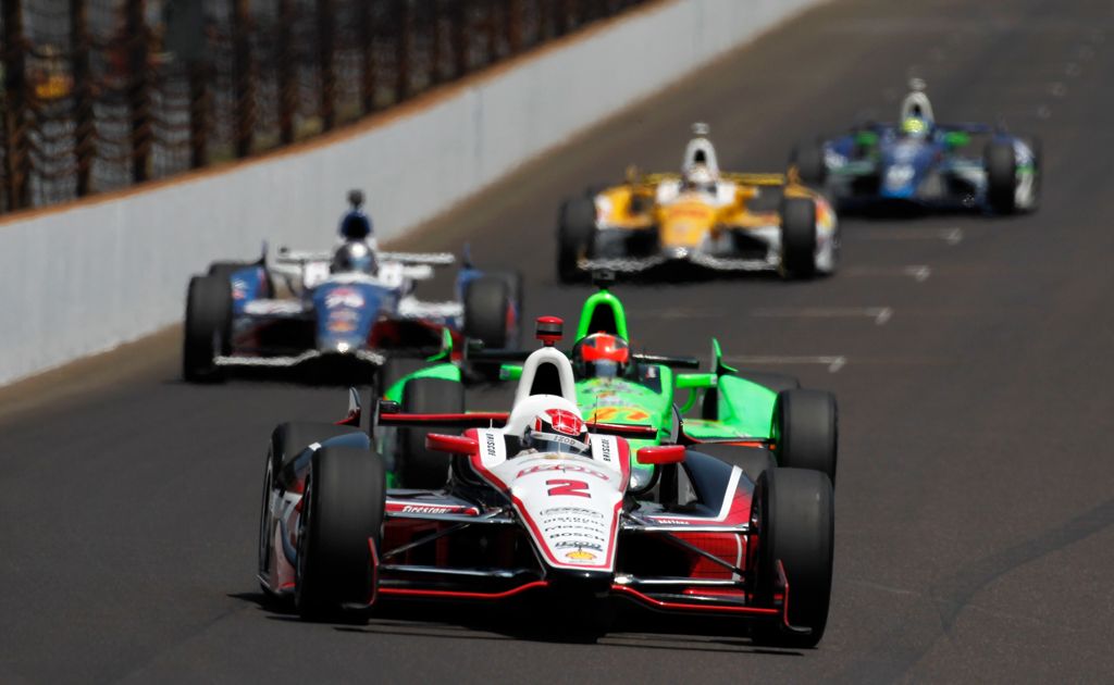 Ryan Briscoe, driver of the #2 IZOD Team Penske Chevrolet, leads a pack of cars into turn one during the IZOD IndyCar Series 96th running of the Indianpolis 500 mile race at the Indianapolis Motor Speedway on May 27, 2012. Ryan Briscoe, driver of the #2 IZOD Team Penske Chevrolet, leads a pack of cars into turn one during the IZOD IndyCar Series 96th running of the Indianpolis 500 mile race at the Indianapolis Motor Speedway on May 27, 2012.