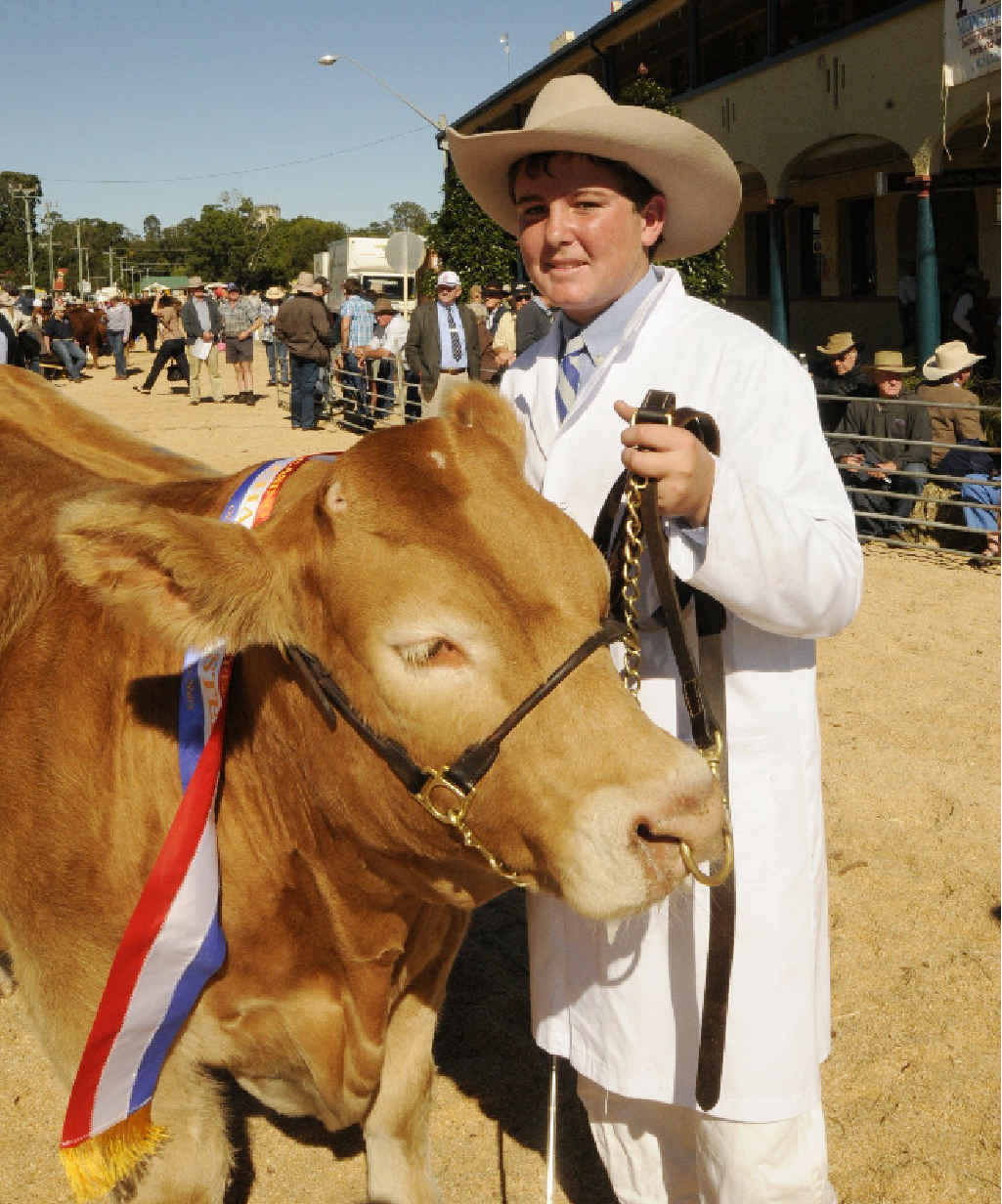 Champion led steer went to Holly Trinity school at Inverell. Student Mitchell with the champion, Bandit. Champion led steer went to Holly Trinity school at Inverell. Student Mitchell with the champion, Bandit.