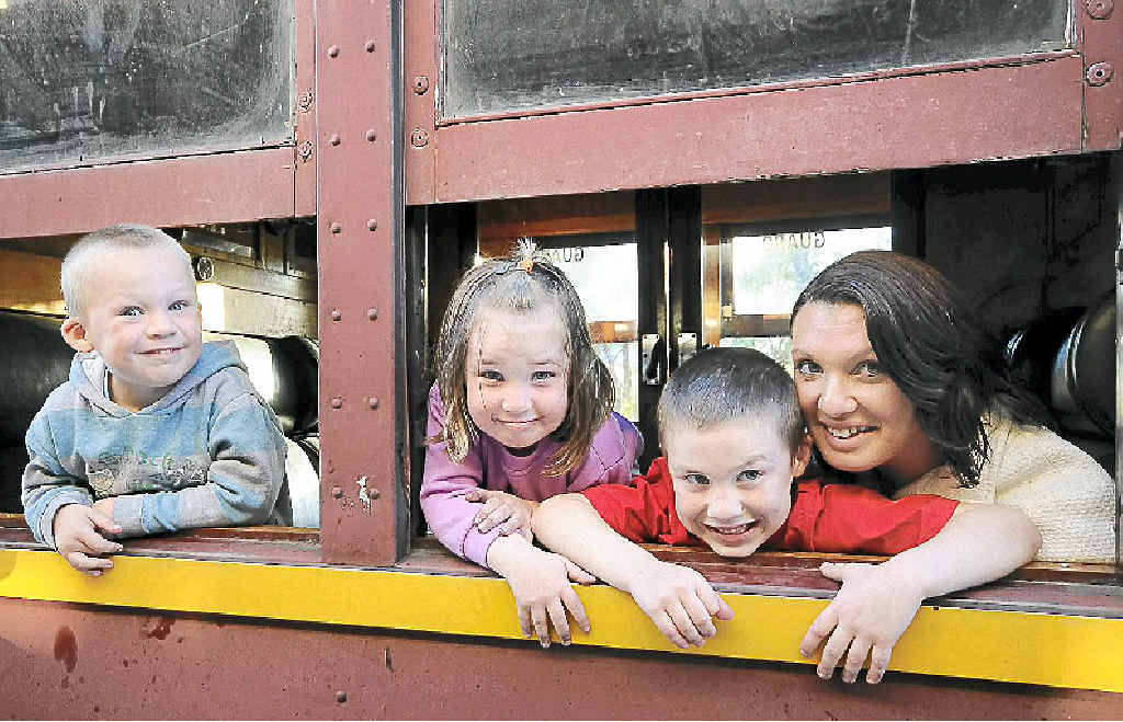 Choya Alexander, of Casino, and children (from left), Skyler, 4, Aliyah, 3, and Winter, 6 on the Lachlan Valley Railway’s 3237 steam engine. Choya Alexander, of Casino, and children (from left), Skyler, 4, Aliyah, 3, and Winter, 6 on the Lachlan Valley Railway’s 3237 steam engine.