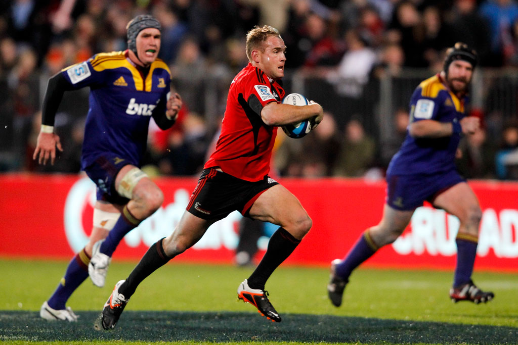 Andy Ellis of the Crusaders makes a break during the round 15 Super Rugby match between the Crusaders and the Highlanders Andy Ellis of the Crusaders makes a break during the round 15 Super Rugby match between the Crusaders and the Highlanders