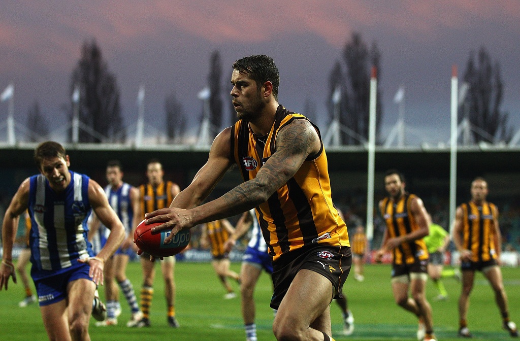 Lance Franklin of the Hawks kicks during the round 10 AFL match between the Hawthorn Hawks and the North Melbourne Kangaroos at Aurora Stadium Lance Franklin of the Hawks kicks during the round 10 AFL match between the Hawthorn Hawks and the North Melbourne Kangaroos at Aurora Stadium