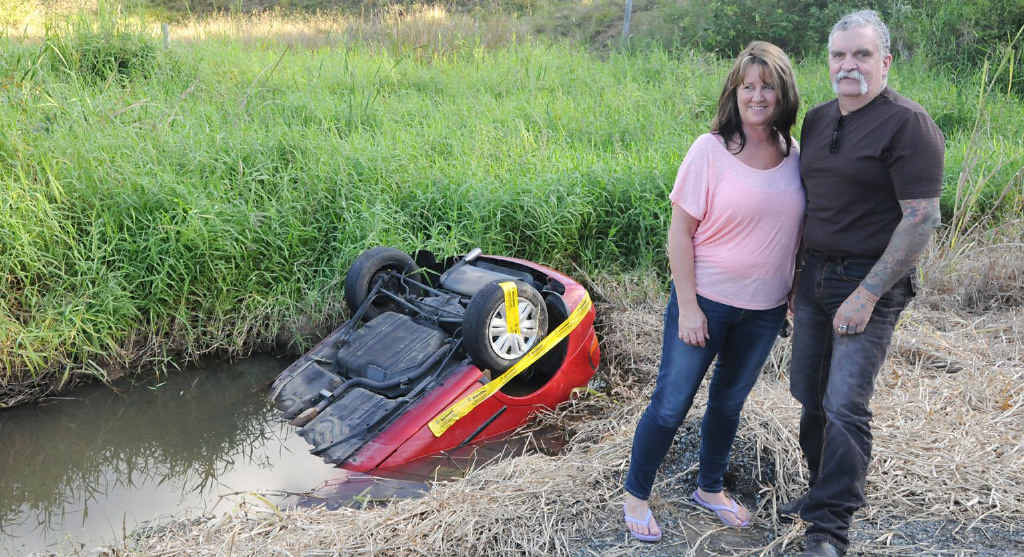 Helen and Mark Warwick saved an 18-year-old female driver from drowning after they stopped to check on her upturned vehicle on Bauple-Woolooga Rd on Saturday. Despite upturned cars being a regular sight in the area, Helen noticed a tail-light and urged her husband to stop. Helen and Mark Warwick saved an 18-year-old female driver from drowning after they stopped to check on her upturned vehicle on Bauple-Woolooga Rd on Saturday. Despite upturned cars being a regular sight in the area, Helen noticed a tail-light and urged her husband to stop.