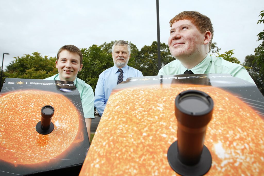 Bundamba State Secondary College students from left, Adam Yarrow, and Sean Priman, with the help of Professional Surveyor Andrew Owen are using Solarscopes. 