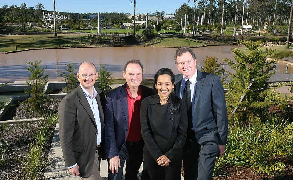 MP Shayne Neumann, Mayor Paul Pisasale, Springfield Land Corporation deputy managing director Raynuha Sinnathamby and Cr David Morrison at the site of the Robelle Domain extension. MP Shayne Neumann, Mayor Paul Pisasale, Springfield Land Corporation deputy managing director Raynuha Sinnathamby and Cr David Morrison at the site of the Robelle Domain extension.