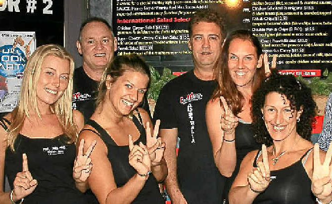 CHEERS: Byron Bay Cheeky Monkey’s owner Monique Phillips (second from right) and staff get ready to celebrate the business’ 12th birthday. CHEERS: Byron Bay Cheeky Monkey’s owner Monique Phillips (second from right) and staff get ready to celebrate the business’ 12th birthday.