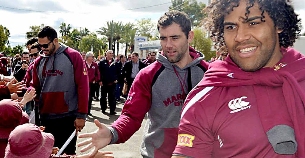 Greg Inglis (left), Cameron Smith and Sam Thaiday shake hands with fans in Roma. Greg Inglis (left), Cameron Smith and Sam Thaiday shake hands with fans in Roma.
