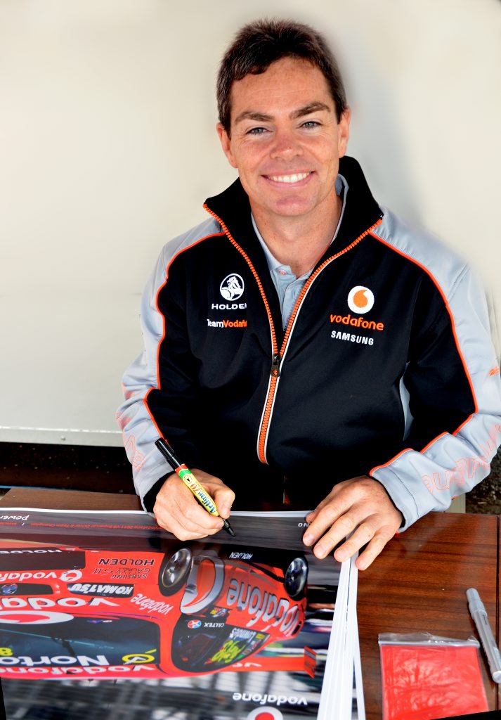 Craig Lowndes signed hundreds of posters for eager fans at the Cooyar car show. Craig Lowndes signed hundreds of posters for eager fans at the Cooyar car show.