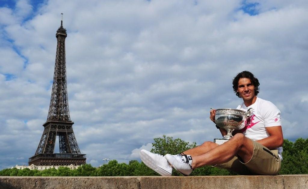 Rafael Nadal celebrates his seventh French Open title after beating Novak Djokovic in the men's singles final at Roland Garros in Paris. Rafael Nadal celebrates his seventh French Open title after beating Novak Djokovic in the men's singles final at Roland Garros in Paris.