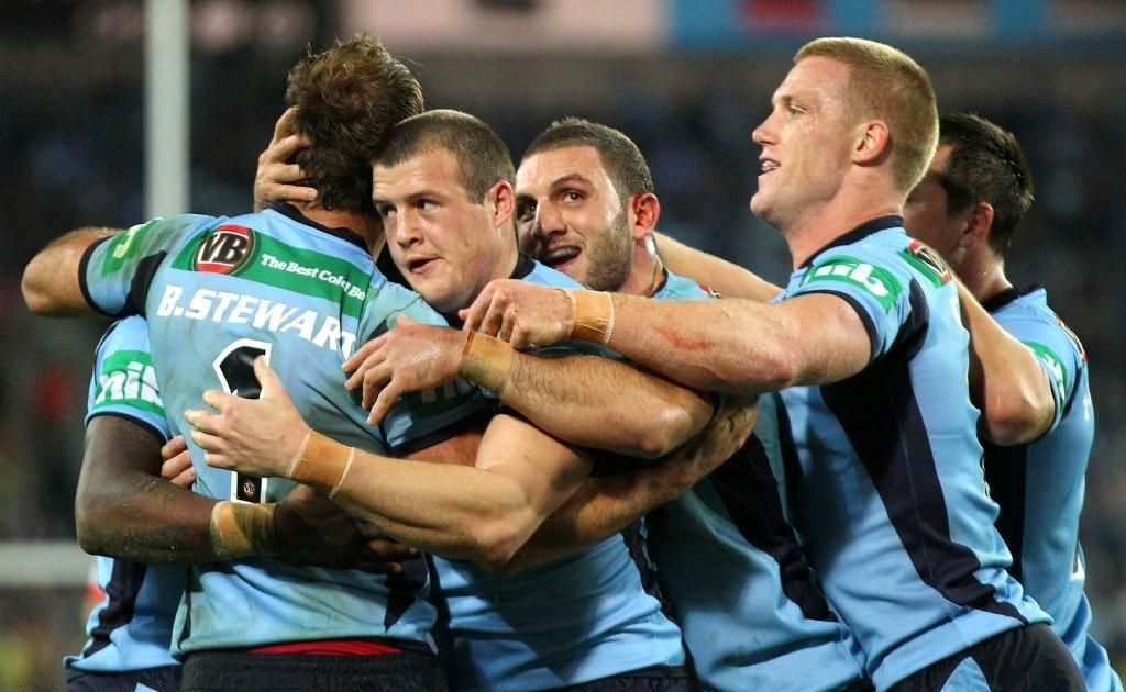 New South Wales Blues players celebrate their win over the Maroons in game 2 of the 2012 State of Origin series. New South Wales Blues players celebrate their win over the Maroons in game 2 of the 2012 State of Origin series.