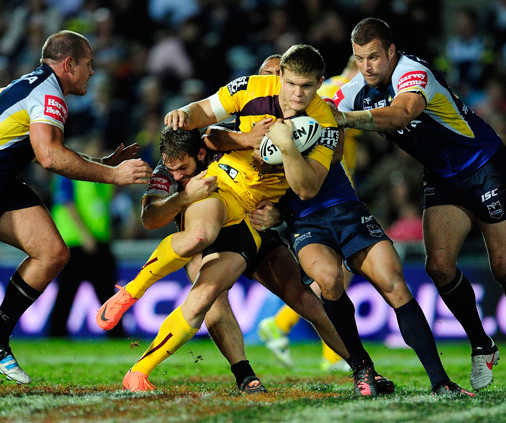 Dale Copley of the Broncos looks get through the Cowboys defence during the round 15 NRL match between the North Queensland Cowboys and the Brisbane Broncos at Dairy Farmers Stadium Dale Copley of the Broncos looks get through the Cowboys defence during the round 15 NRL match between the North Queensland Cowboys and the Brisbane Broncos at Dairy Farmers Stadium
