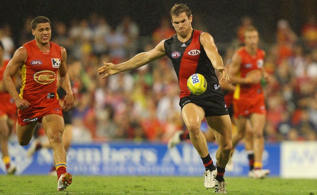 Stewart Crameri of the Bombers kicks during the round three AFL match between the Gold Coast Suns and the Essendon Bombers at Metricon Stadium on April 14, 2012 in Gold Coast, Australia. Stewart Crameri of the Bombers kicks during the round three AFL match between the Gold Coast Suns and the Essendon Bombers at Metricon Stadium on April 14, 2012 in Gold Coast, Australia.