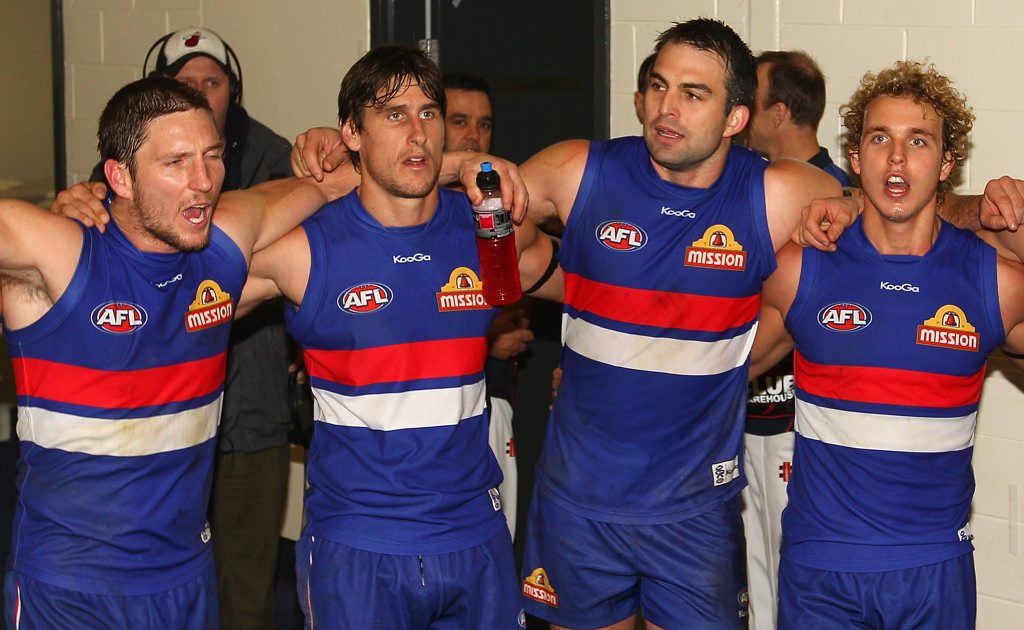 Matthew Boyd, Ryan Griffen, Brian Lake and Mitch Wallis of the Bulldogs sing the song in the rooms after winning the round 12 AFL match between the Western Bulldogs and the Port Adelaide Power at Etihad Stadium on June 17, 2012 in Melbourne, Australia. Matthew Boyd, Ryan Griffen, Brian Lake and Mitch Wallis of the Bulldogs sing the song in the rooms after winning the round 12 AFL match between the Western Bulldogs and the Port Adelaide Power at Etihad Stadium on June 17, 2012 in Melbourne, Australia.