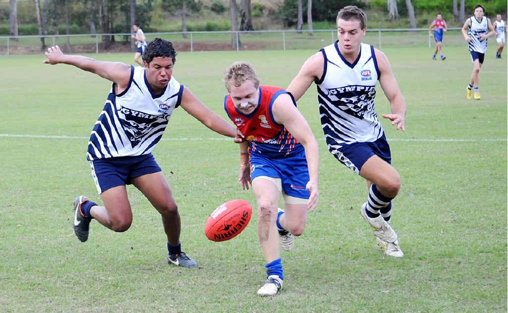 Some of the young Cats’ brigade led by Reimarley O’Donaghue attack the ball on Saturday at Six Mile Oval. Some of the young Cats’ brigade led by Reimarley O’Donaghue attack the ball on Saturday at Six Mile Oval.