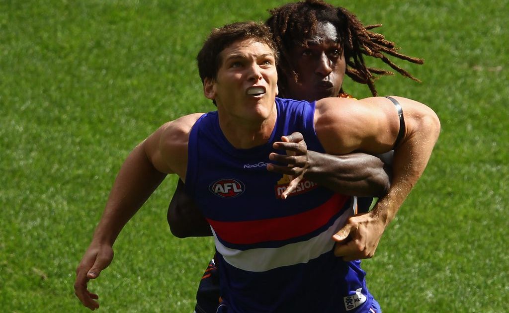 Tony Liberatore believes the sledge Will Minson (front) directed at Port Adelaide's Danyle Pearce regarding his mother was Tony Liberatore believes the sledge Will Minson (front) directed at Port Adelaide's Danyle Pearce regarding his mother was