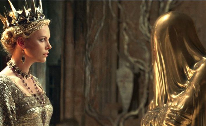 Charlize Theron in a scene from the movie Snow White and the Huntsman. Charlize Theron in a scene from the movie Snow White and the Huntsman.