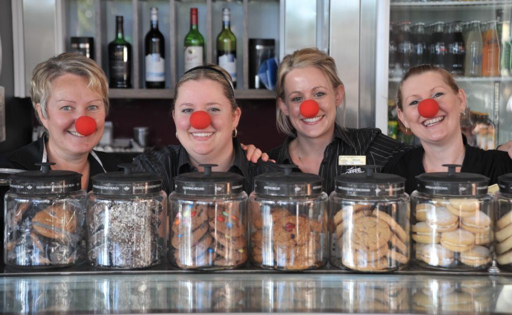 Staff from the Coffee Club at Kawana Shoppingworld (L-R) Melissa Ambrose, Michelle Lonergan, Megan Barker and Melanie McDonald will be embracing Red Nose Day on June 29. Staff from the Coffee Club at Kawana Shoppingworld (L-R) Melissa Ambrose, Michelle Lonergan, Megan Barker and Melanie McDonald will be embracing Red Nose Day on June 29.