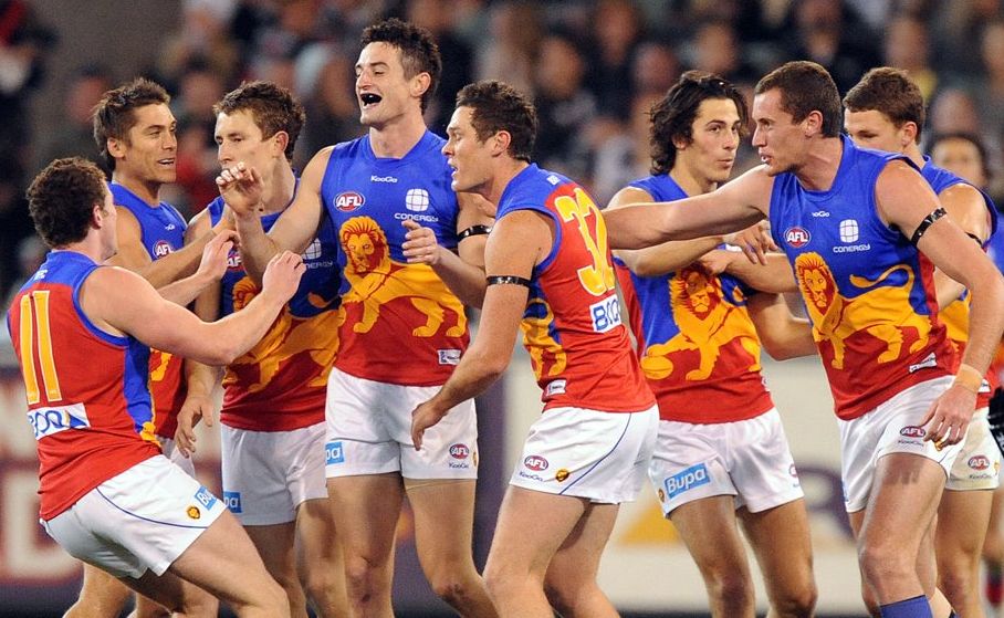 Niall McKeever of the Brisbane Lions is congratulated by team-mates after kicking his first career goal in 2011. Niall McKeever of the Brisbane Lions is congratulated by team-mates after kicking his first career goal in 2011.