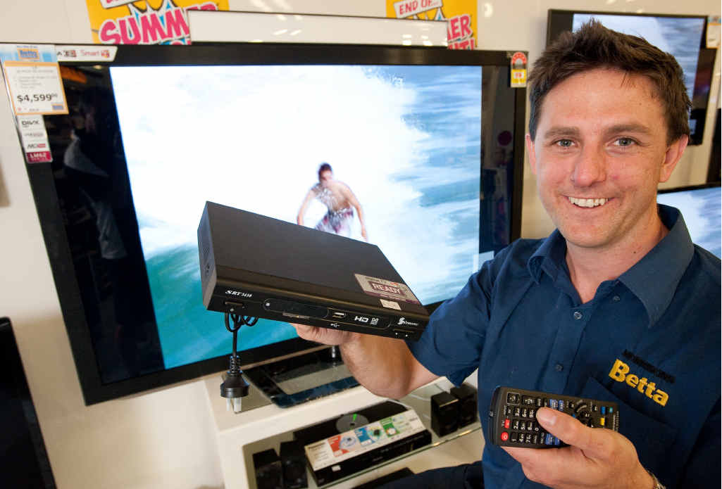 Brett Morrison from Morrisons Betta Electrical with a set top box. Analog TV signals will be permanently switched off in Northern NSW on November 27.
