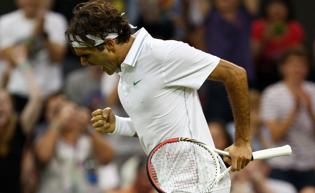Roger Federer of Switzerland celebrates set point during his Gentlemen's Singles third round match against Julien Benneteau of France on day five of the Wimbledon Lawn Tennis Championships . Roger Federer of Switzerland celebrates set point during his Gentlemen's Singles third round match against Julien Benneteau of France on day five of the Wimbledon Lawn Tennis Championships .