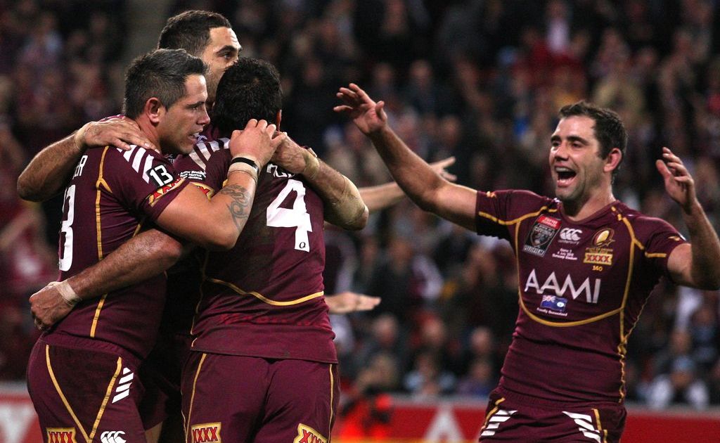 Justin Hodges of the Maroons celebrates with team mates after scoring a try during game three of the 2012 State of Origin series between the Queensland Maroons and the New South Wales Blues at Suncorp Stadium on July 4, 2012 in Brisbane. Justin Hodges of the Maroons celebrates with team mates after scoring a try during game three of the 2012 State of Origin series between the Queensland Maroons and the New South Wales Blues at Suncorp Stadium on July 4, 2012 in Brisbane.