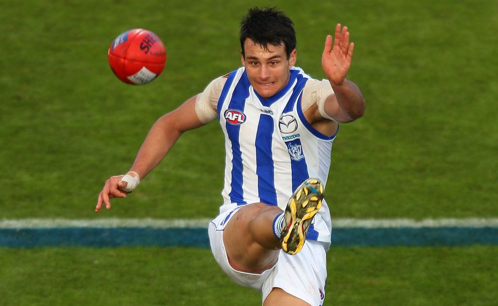 Robbie Tarrant of the Kangaroos kicks the ball during the round 15 AFL match between the North Melbourne Kangaroos and the West Coast Eagles at Blundstone Arena Robbie Tarrant of the Kangaroos kicks the ball during the round 15 AFL match between the North Melbourne Kangaroos and the West Coast Eagles at Blundstone Arena