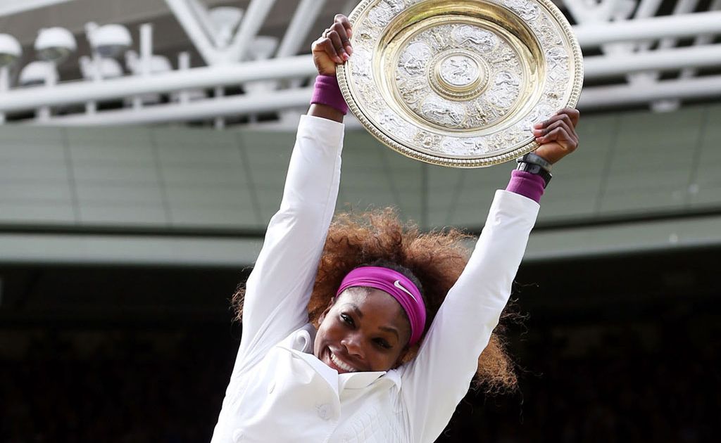 Serena Williams of the USA jumps in the air with the winners trophy and celebrates after her Ladies' Singles final match against Agnieszka Radwanska of Poland on day twelve of the Wimbledon Lawn Tennis Championships at the All England Lawn Tennis and Croquet Club. Serena Williams of the USA jumps in the air with the winners trophy and celebrates after her Ladies' Singles final match against Agnieszka Radwanska of Poland on day twelve of the Wimbledon Lawn Tennis Championships at the All England Lawn Tennis and Croquet Club.