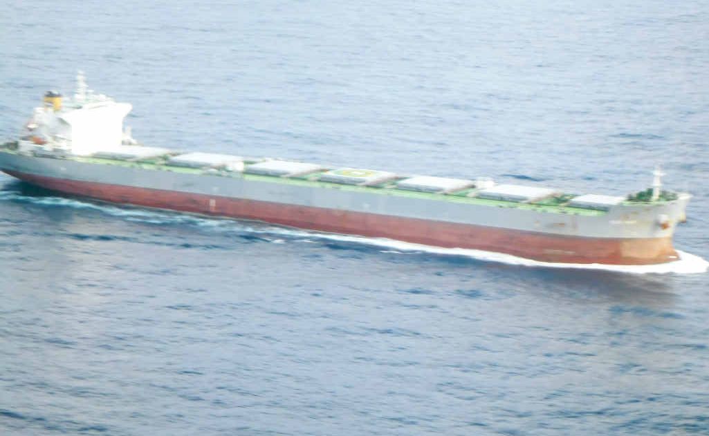 The bulk carrier Blue Wave remains in the ocean off Evans Head while the search for the crewman continues. The bulk carrier Blue Wave remains in the ocean off Evans Head while the search for the crewman continues.