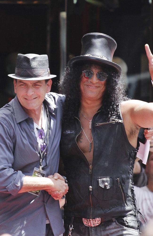 Charlie Sheen and Slash at the Hollywood Walk of Fame ceremony. Charlie Sheen and Slash at the Hollywood Walk of Fame ceremony.