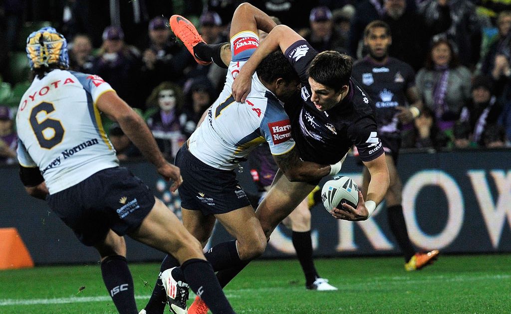 Gareth Widdop of the Storm is tackled during the round 19 NRL match between the Melbourne Storm and the North Queensland Cowboys at AAMI Park Gareth Widdop of the Storm is tackled during the round 19 NRL match between the Melbourne Storm and the North Queensland Cowboys at AAMI Park