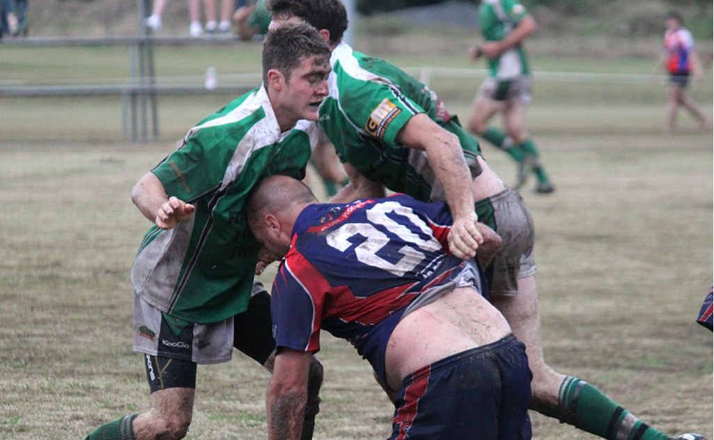 The Stags’ Jarrod Malcomsen and Travis Backhouse taking down a Yowie. The Stags’ Jarrod Malcomsen and Travis Backhouse taking down a Yowie.