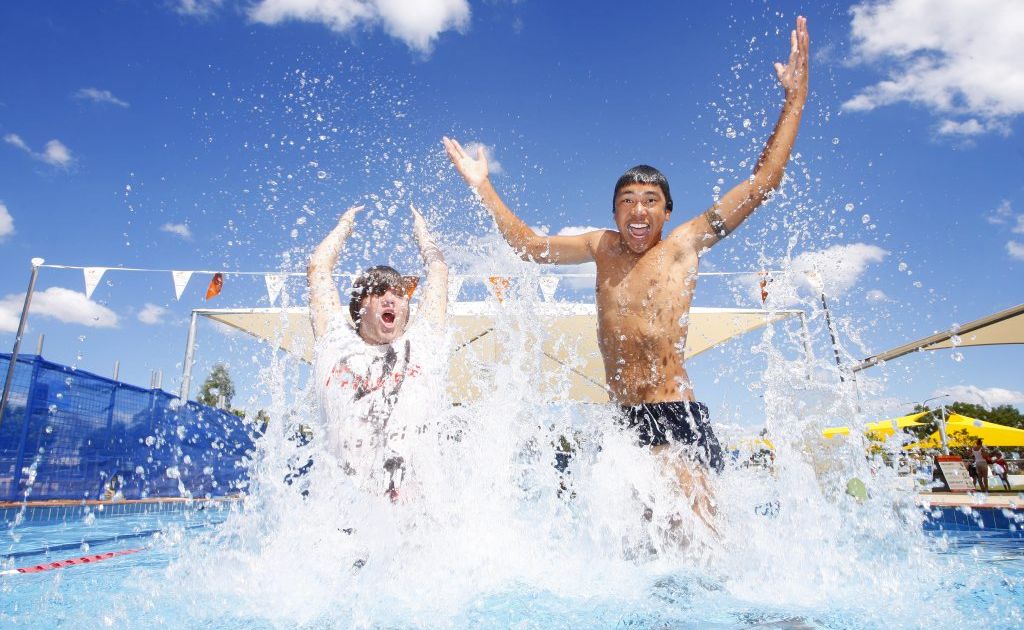 Leo Samia, 15, of Ipswich and Tyron Green, 15, of Bundamba cool off at the Bundamba Swim Centre. Leo Samia, 15, of Ipswich and Tyron Green, 15, of Bundamba cool off at the Bundamba Swim Centre.