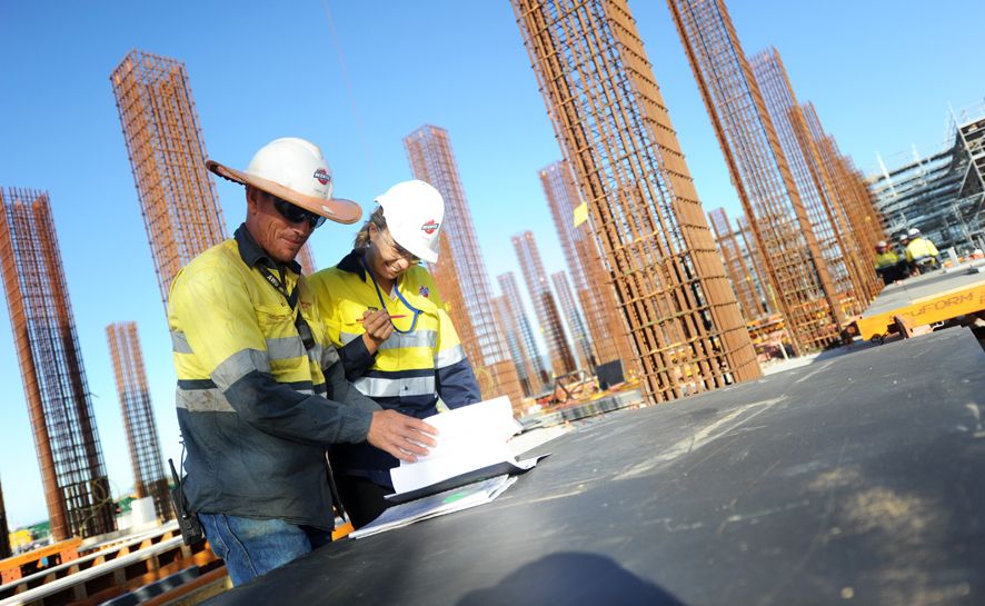 ALL HAPPENING: Steel fixer Nathan Tabb shows a guest around the construction site on Curtis Island, Gladstone. ALL HAPPENING: Steel fixer Nathan Tabb shows a guest around the construction site on Curtis Island, Gladstone.