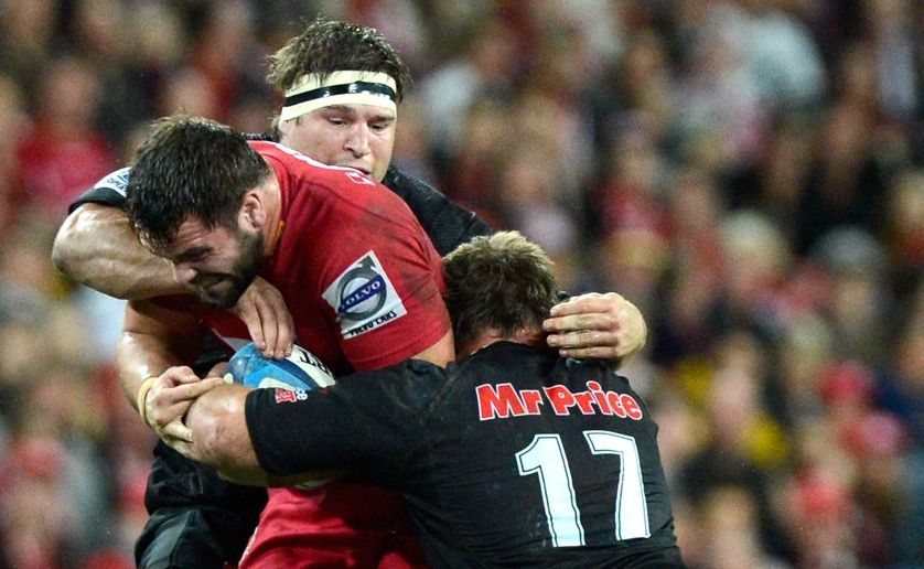 James Hanson of the Reds charges into the defence during the Super Rugby Qualifying Final between the Reds and the Sharks at Suncorp Stadium on July 21, 2012 in Brisbane, Australia. James Hanson of the Reds charges into the defence during the Super Rugby Qualifying Final between the Reds and the Sharks at Suncorp Stadium on July 21, 2012 in Brisbane, Australia.