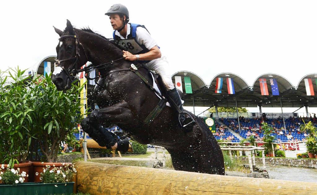 Australian eventing rider Chris Burton in action at the World Equestrian Festival in Germany last month. Australian eventing rider Chris Burton in action at the World Equestrian Festival in Germany last month.