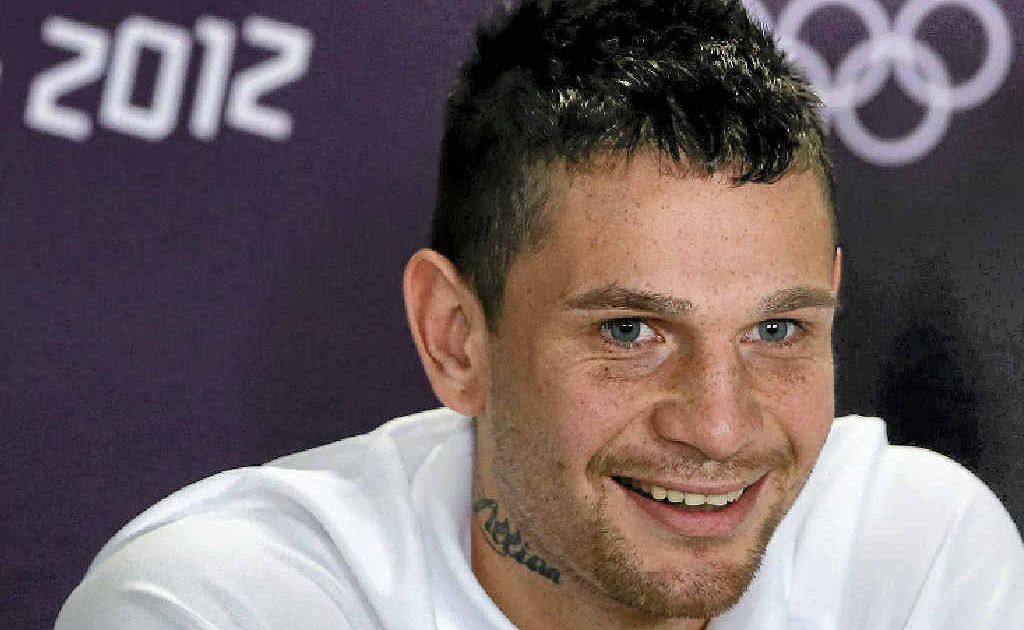 Controversial Australian boxer Damien Hooper was all smiles at a press conference in London yesterday ahead of his Olympic debut. Controversial Australian boxer Damien Hooper was all smiles at a press conference in London yesterday ahead of his Olympic debut.