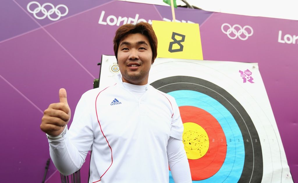 South Korean archer Im Dong Hyun celebrates smashing a world record. South Korean archer Im Dong Hyun celebrates smashing a world record.