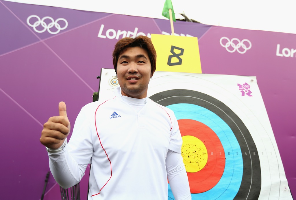 South Korean archer Im Dong Hyun celebrates smashing a world record. South Korean archer Im Dong Hyun celebrates smashing a world record.