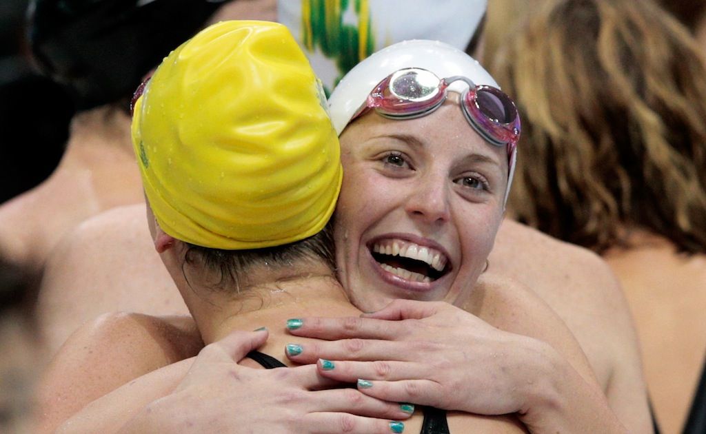 The Australian team celebrate winning the women's 400 metre freestyle relay final. The Australian team celebrate winning the women's 400 metre freestyle relay final.
