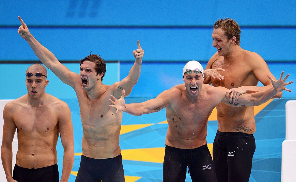 Clement Lefert, Fabien Gilot and Amaury Leveaux of France celebrate after winning the gold in the Men's 4x100m Freestyle Realty on Day 2 of the London 2012 Olympic Games at the Aquatics Centre on July 29, 2012 in London, England. Clement Lefert, Fabien Gilot and Amaury Leveaux of France celebrate after winning the gold in the Men's 4x100m Freestyle Realty on Day 2 of the London 2012 Olympic Games at the Aquatics Centre on July 29, 2012 in London, England.