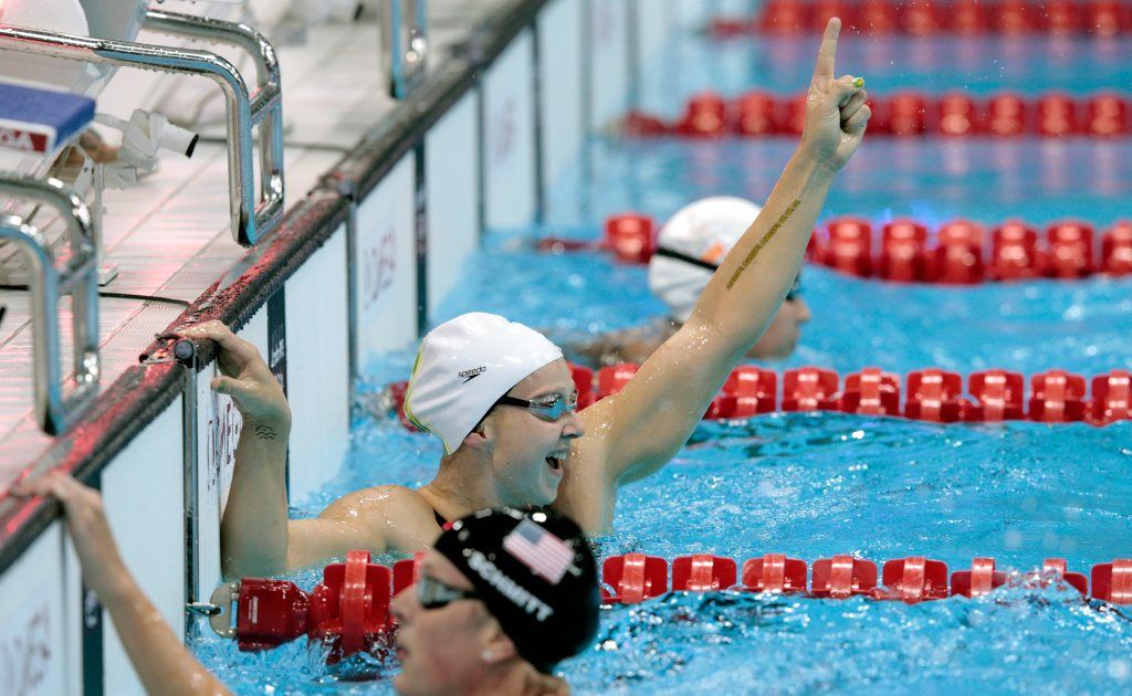 Melanie Schlanger of Australia celebrates after she swam the last leg of the relay to win the Final of the Women's 4x100m Freestyle Relay on Day 1 of the London 2012 Olympic Games at the Aquatics Centre on July 28, 2012 in London, England. Melanie Schlanger of Australia celebrates after she swam the last leg of the relay to win the Final of the Women's 4x100m Freestyle Relay on Day 1 of the London 2012 Olympic Games at the Aquatics Centre on July 28, 2012 in London, England.
