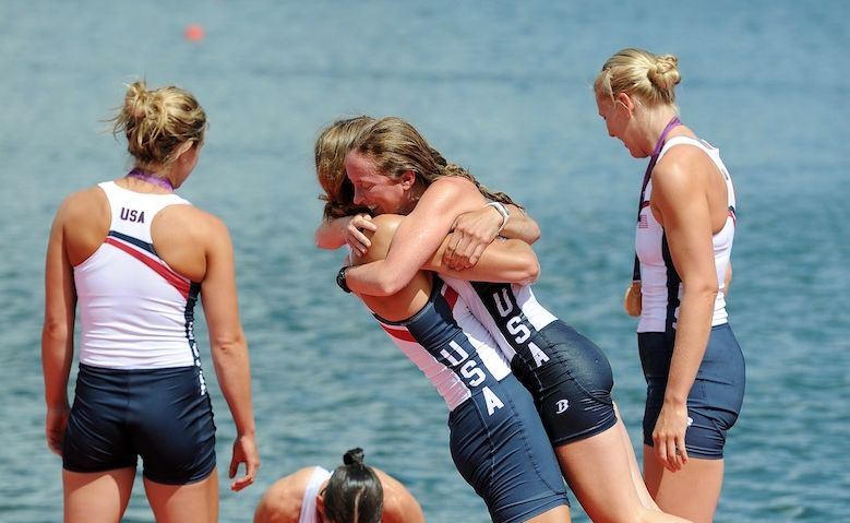The United States team celebrates winning gold in the women's eight. The United States team celebrates winning gold in the women's eight.