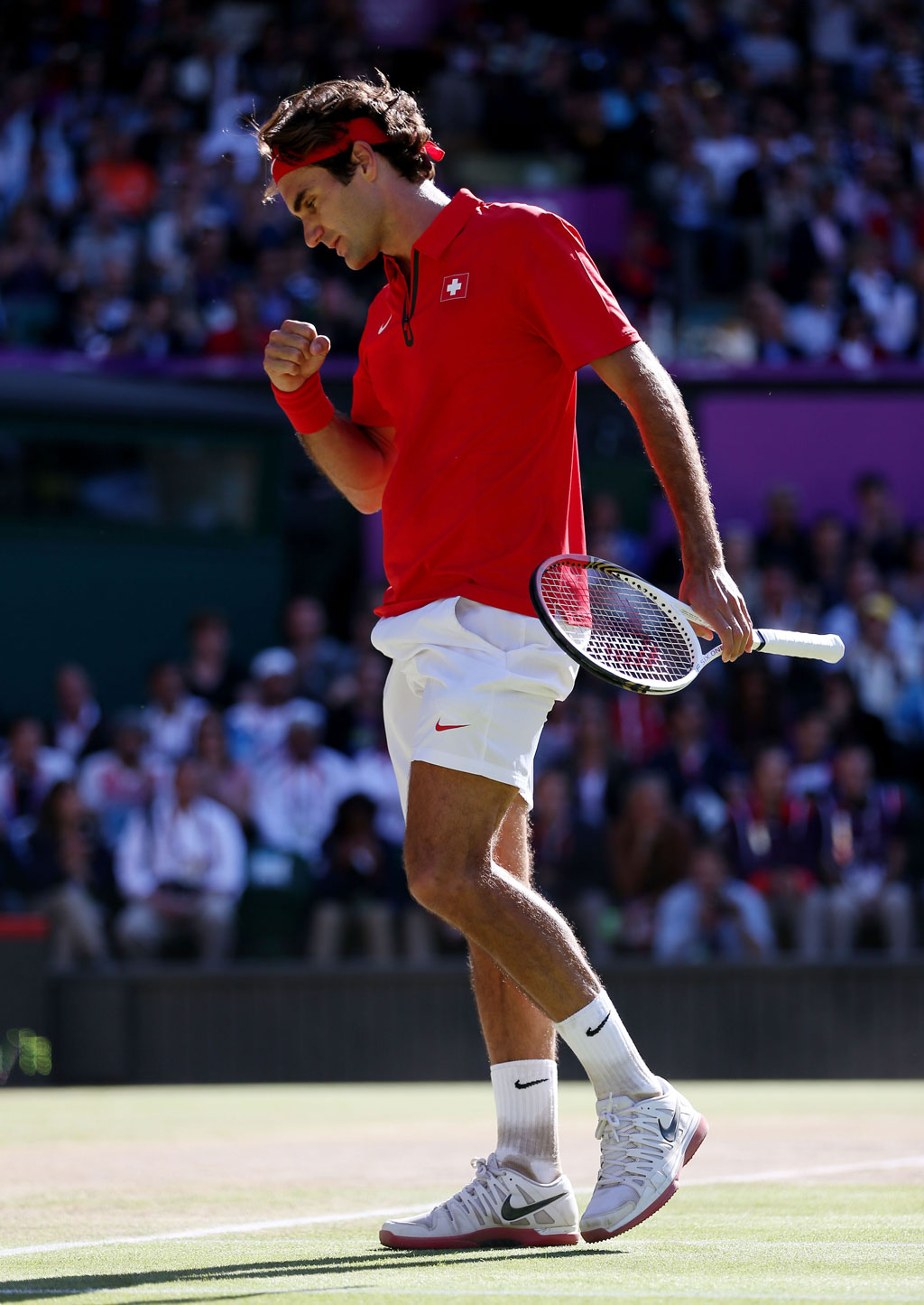 Roger Federer of Switzerland celebrates a point against Juan Martin Del Potro of Argentina in the Semifinal of Men's Singles Tennis on Day 7 of the London 2012 Olympic Games at Wimbledon on August 3, 2012 in London, England. Federer defeated Del Potro 4-6, 7-6, 19-17. Roger Federer of Switzerland celebrates a point against Juan Martin Del Potro of Argentina in the Semifinal of Men's Singles Tennis on Day 7 of the London 2012 Olympic Games at Wimbledon on August 3, 2012 in London, England. Federer defeated Del Potro 4-6, 7-6, 19-17.