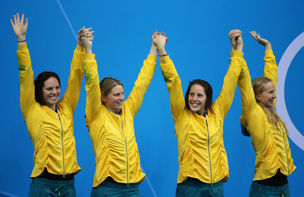 Silver medallists (L-R) Emily Seebohm, Leisel Jones, Alicia Coutts and Melanie Schlanger of Australia celebrate on the podium during the medal ceremony for the Women's 4x100m Meldey Relay Final Silver medallists (L-R) Emily Seebohm, Leisel Jones, Alicia Coutts and Melanie Schlanger of Australia celebrate on the podium during the medal ceremony for the Women's 4x100m Meldey Relay Final