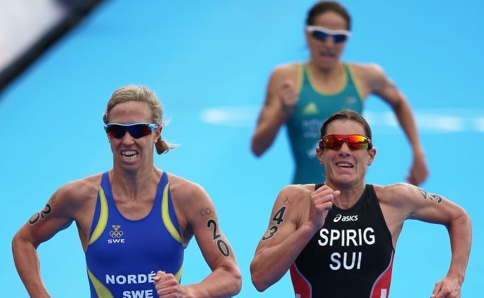 Erin Densham finishes behind Nicola Spirig (right) and Lisa Norden (left). Erin Densham finishes behind Nicola Spirig (right) and Lisa Norden (left).