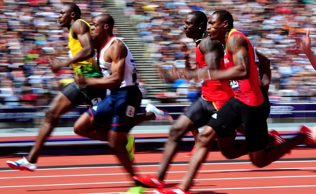 (L-R) Usain Bolt of Jamaica and James Dasaolu of Great Britain compete in the Men's 100m Round 1 Heats on Day 8 of the London 2012 Olympic Games (L-R) Usain Bolt of Jamaica and James Dasaolu of Great Britain compete in the Men's 100m Round 1 Heats on Day 8 of the London 2012 Olympic Games