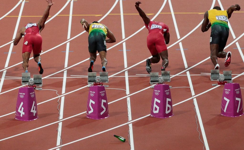 A spectator allegedly threw a bottle onto the track of the men's 100 metre final. A spectator allegedly threw a bottle onto the track of the men's 100 metre final.